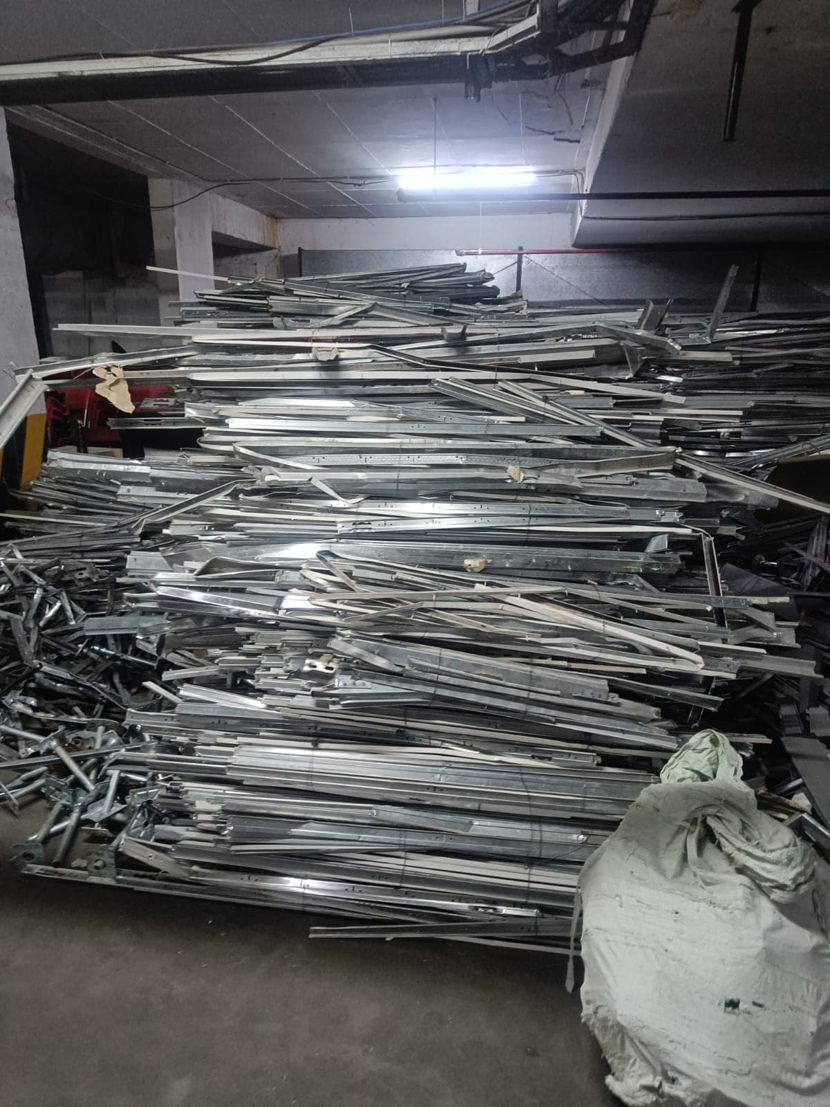 Aarohan Enterprises - Industrial Transformer Decommissioning: Step-down oil-cooled electrical transformer dismantled for copper and core salvage. (Photo 083)