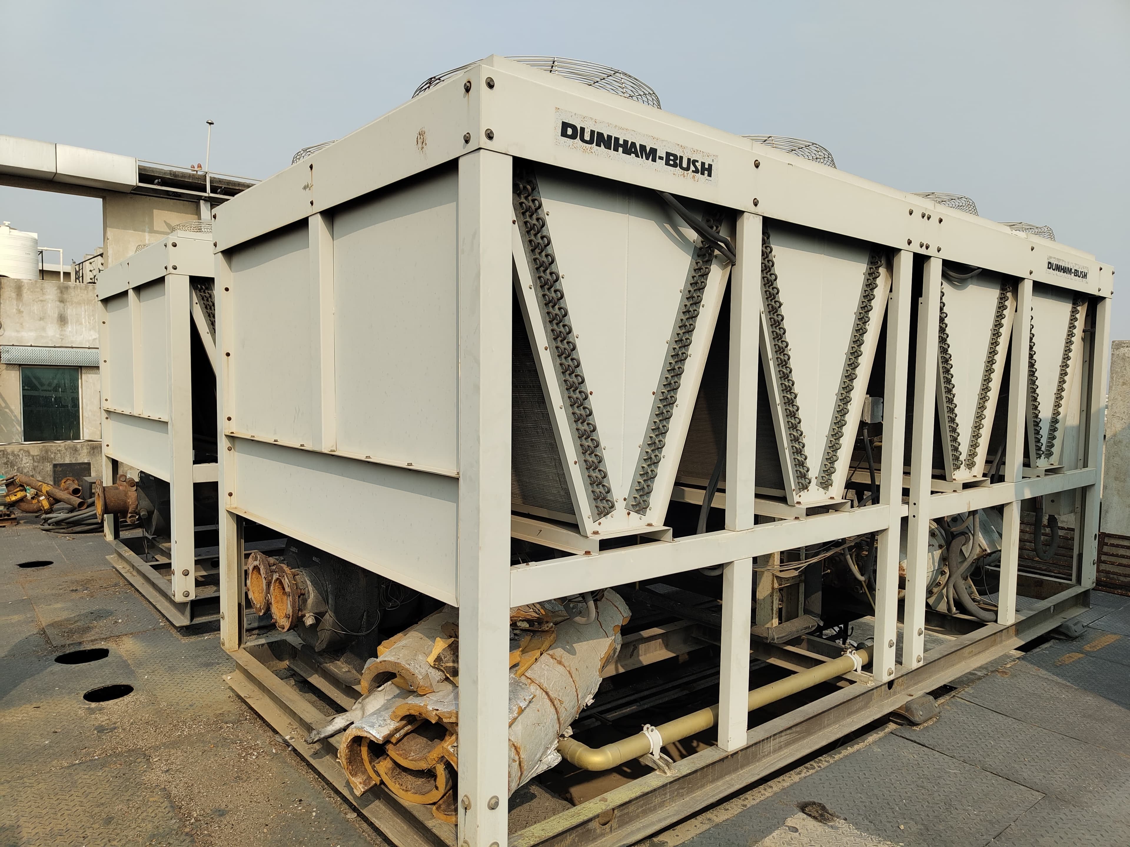 Aarohan Enterprises - Reinforced Concrete Crusher Operations: Crushing and sorting of reinforced masonry debris during industrial plant clearance. (Photo 086)